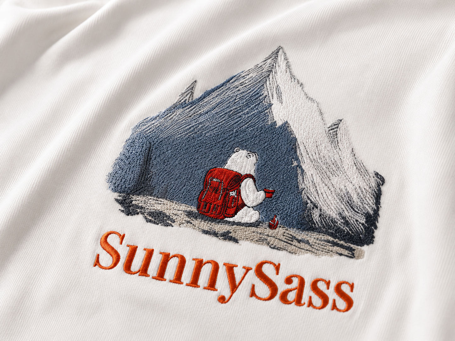 SunnySass UV-reactive embroidery before and after sunlight exposure