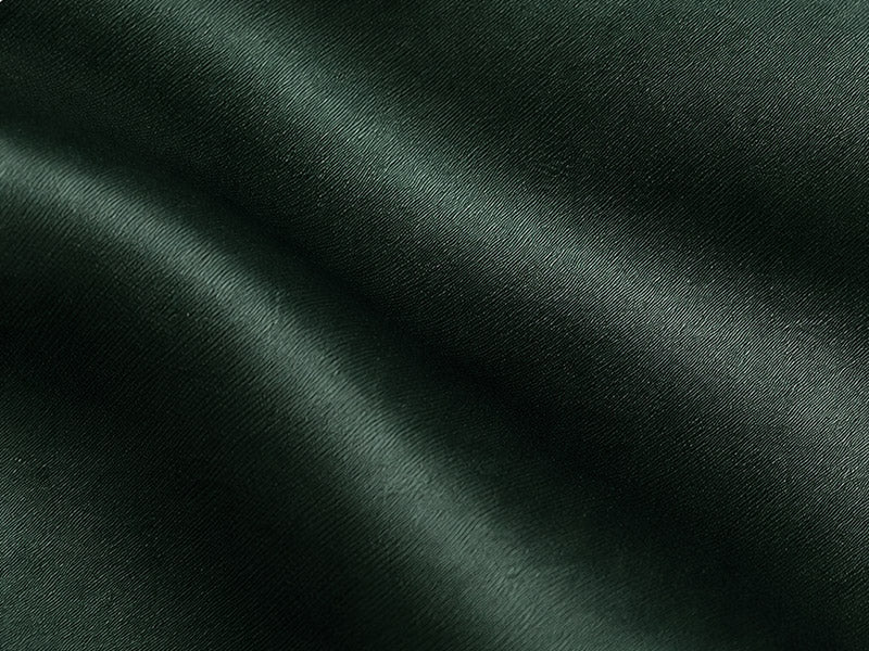 Close-up of forest green 22-momme mulberry silk