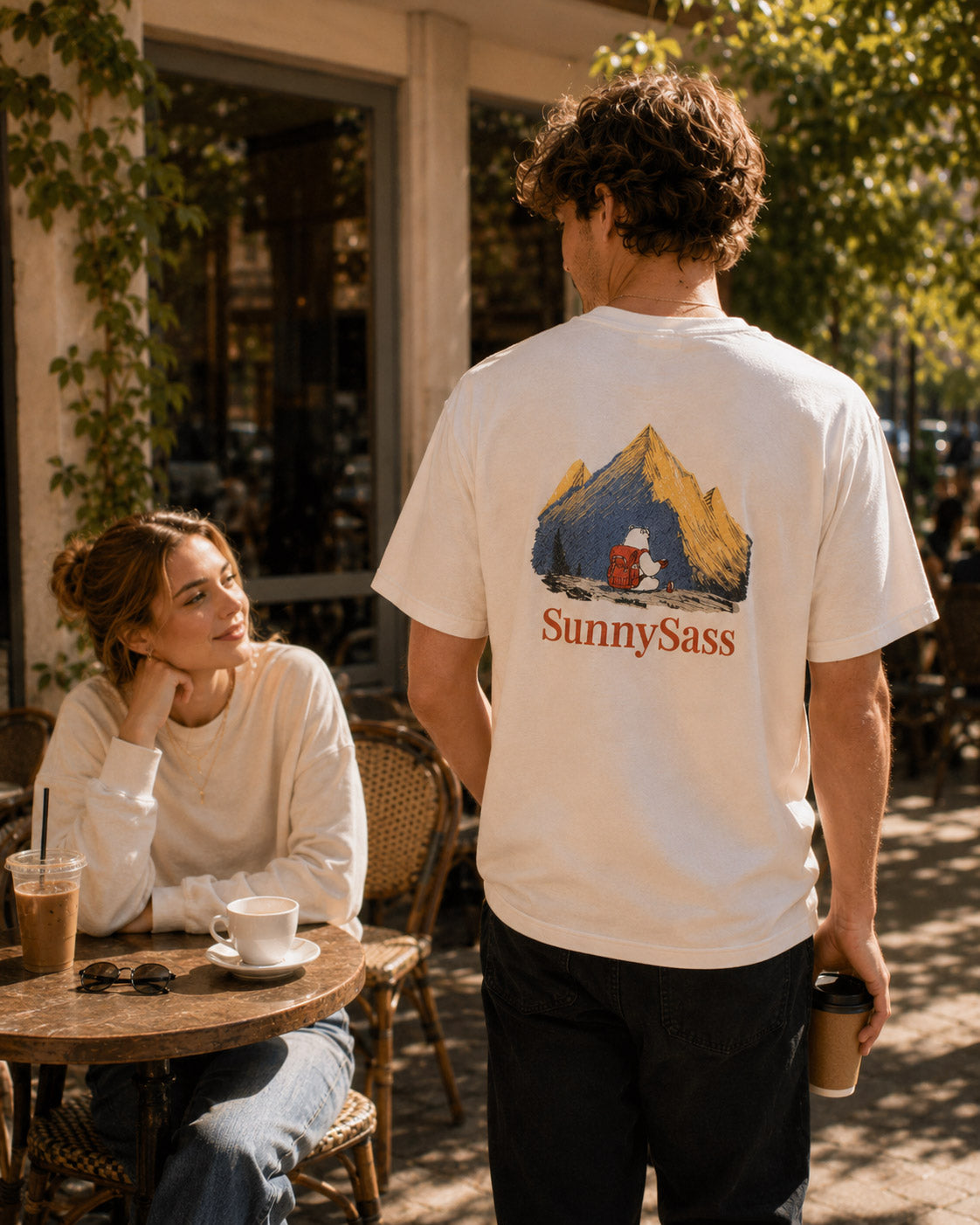 SunnySass Sunlit Peaks Tee revealing soft golden embroidery in sunlight