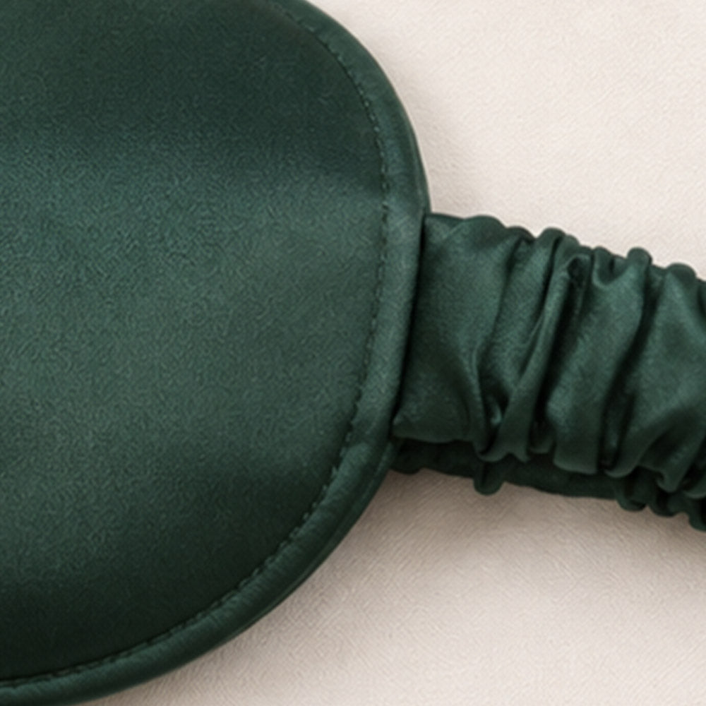 Close-up of the embedded silk-wrapped adjustable strap connection