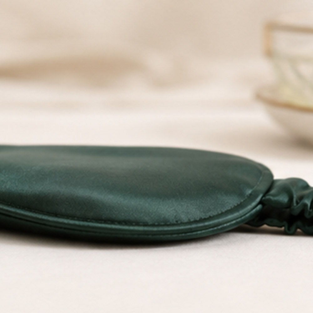 Side profile showing the light and evenly filled silk sleep mask construction