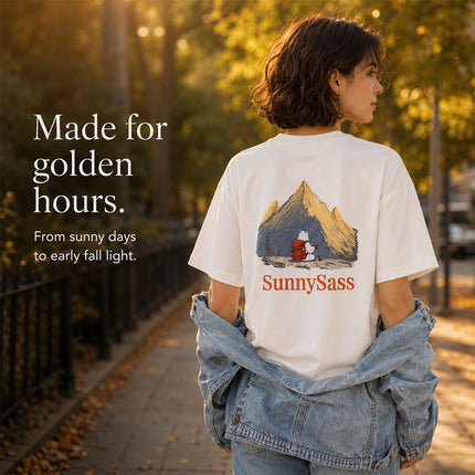 White embroidered T-shirt worn outdoors in early fall golden-hour light